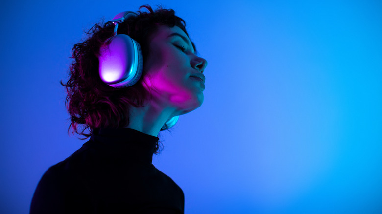 A professional picture of a person wearing headphones