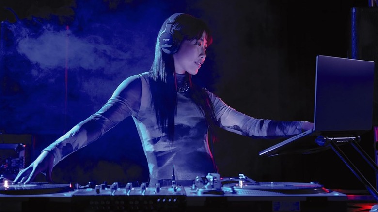 A DJ using the Sony MDR-M1 headphones