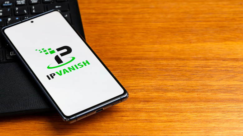 IPVanish on a phone placed on a laptop