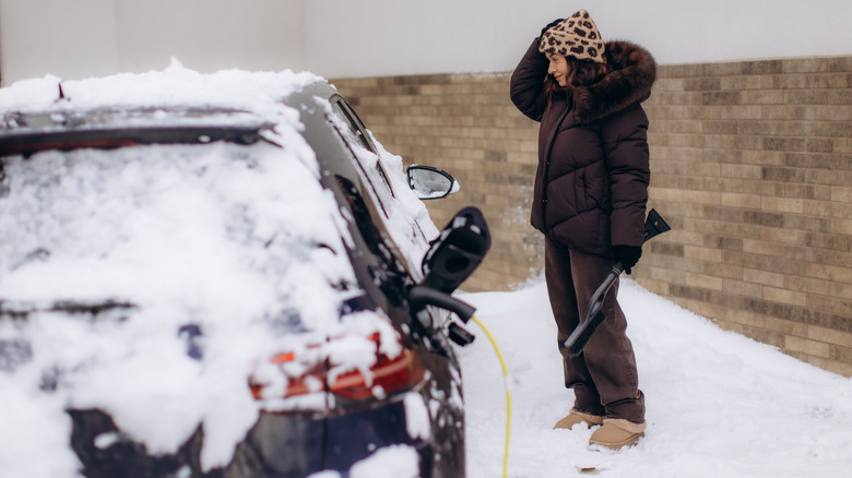 An EV covered in snow