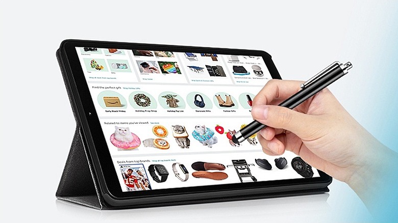 Shopping on a tablet using a stylus pen.
