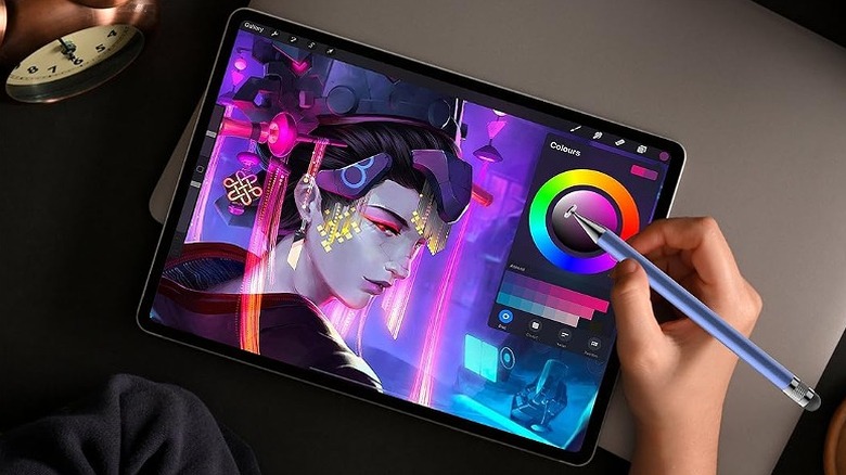 Editing graphics using a stylus on a tablet.