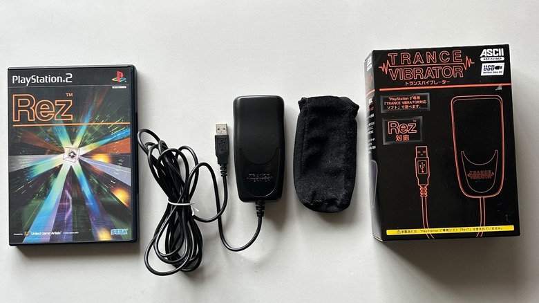 The Trance Vibrator and a copy of Rez for the PS2, placed on a table
