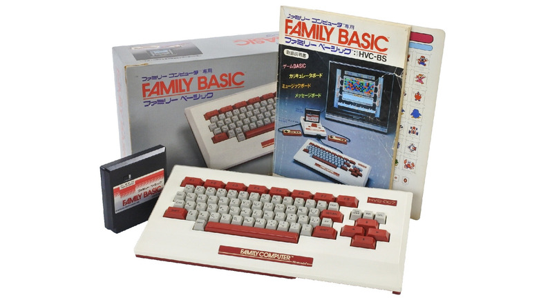 The Family BASIC with the cartridge, packaging, and keyboard on a white background