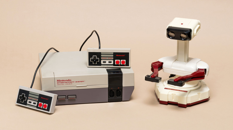 R.O.B. next to a NES