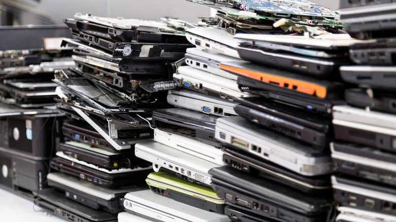 A stack of old, broken, or obselete devices for repair or resale