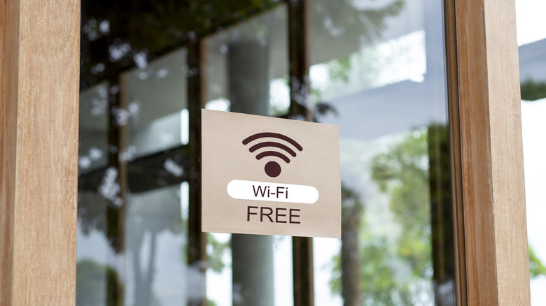 A free Wi-Fi sign on a glass door