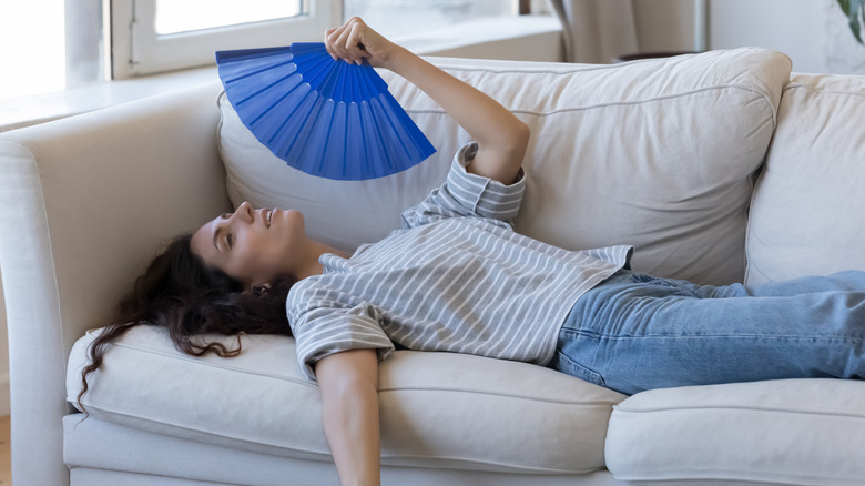 person-on-a-couch-feeling-hot