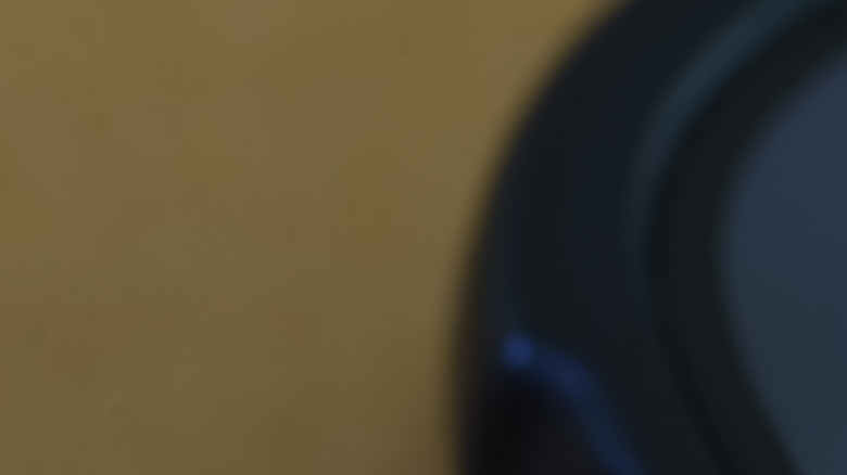 Close-up of the Messenger app on an iPhone with a notification badge
