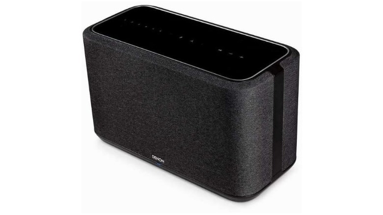 Black Denon speaker with a wide control panel