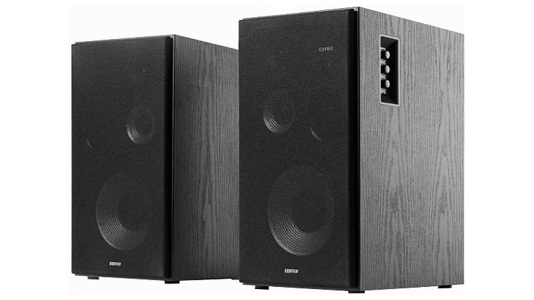 Two Edifier speakers with a wooden black finish