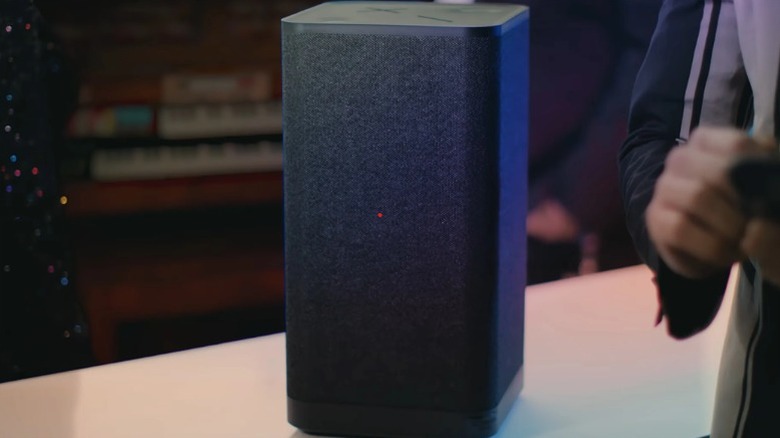 Black portable speaker standing vertically