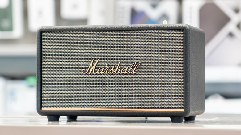 A Marshall speaker on a flat surface.