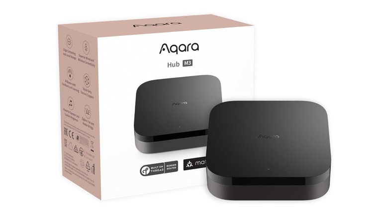 An Aqara M3 smart home hub and its box against a white background.