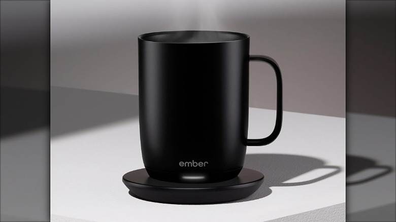 Black Ember mug placed on a charging plate