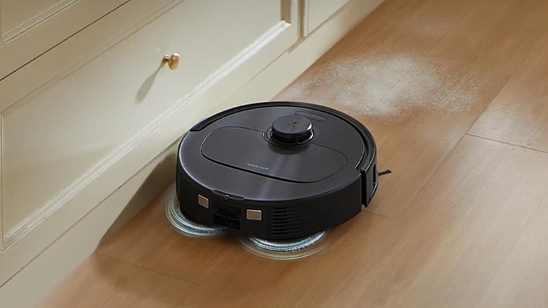 Roborock vacuum cleaning a wooden floor