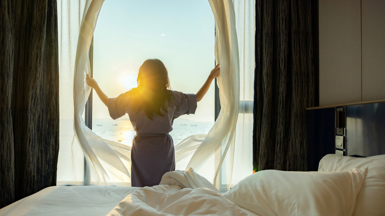 woman-talking-on-phone-next-to-smart-light