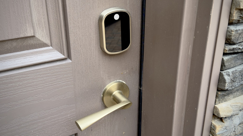 woman-holding-bags-and-baby