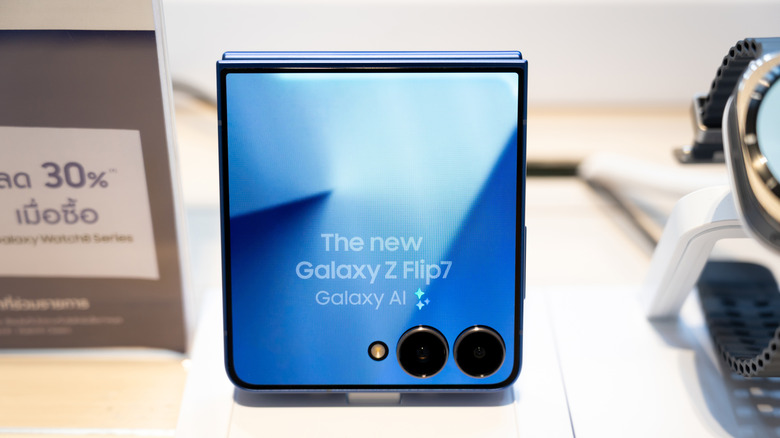 A Samsung Galaxy Z Flip7 placed on display, with a focus on its cover screen