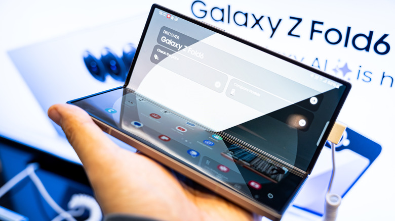 Hand holding a galazy z fold 6 phone