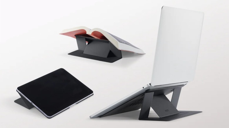 Three images of the Moft invisible stand used to hold a book, a tablet, and a laptop.