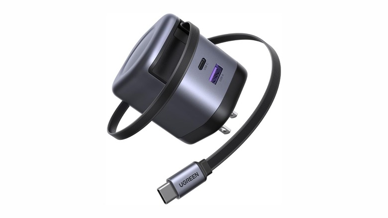A Ugreen charging head with a retractable USB-C cable against a white background.