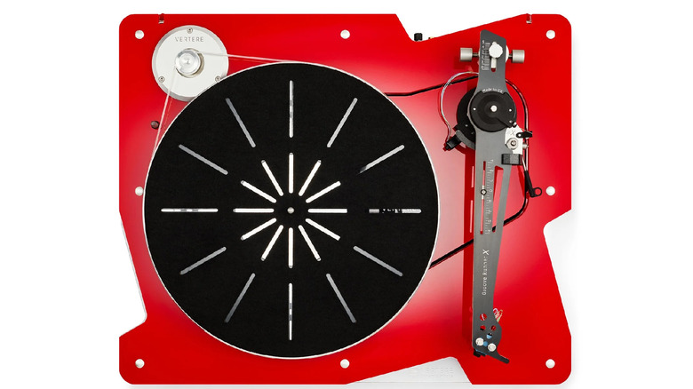 A red Vertere DG-X on a white background