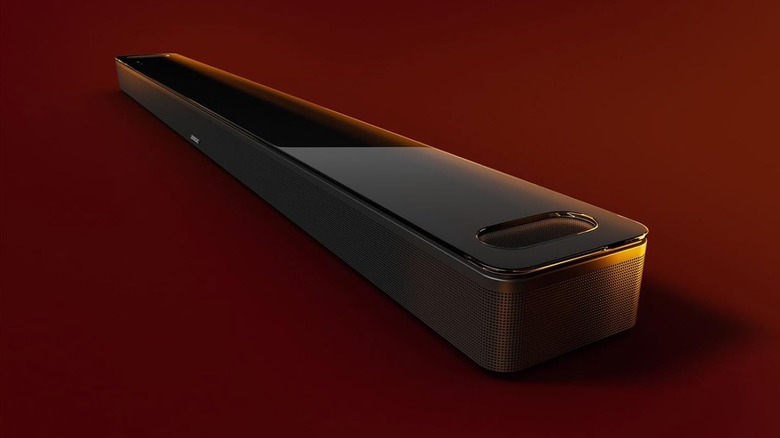 The Bose Smart Ultra Soundbar on a red background.