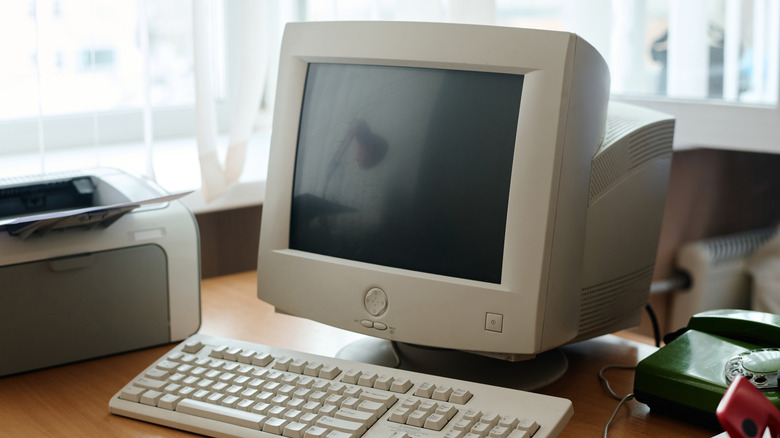 A old computer setup with a CRT monitor