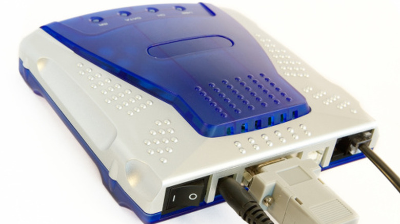 A blue and white dial-up modem