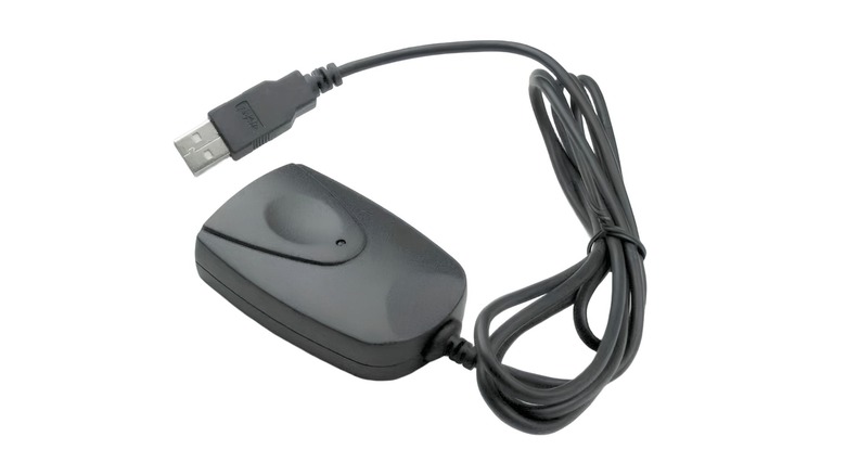 Black USB infrared dongle on white background