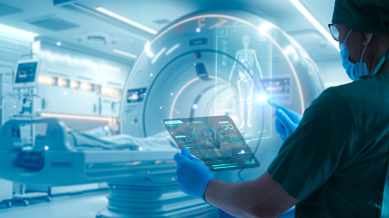 Surgeon with holographic display of the human body