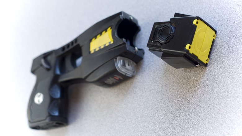 Taser handgun with cartridge