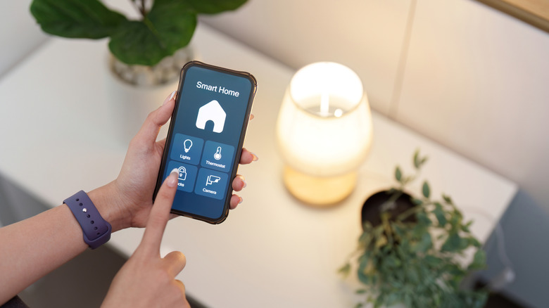 Using an app on a smartphone to control a smart light