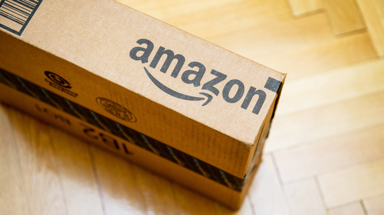 A cardboard box with the Amazon logo.