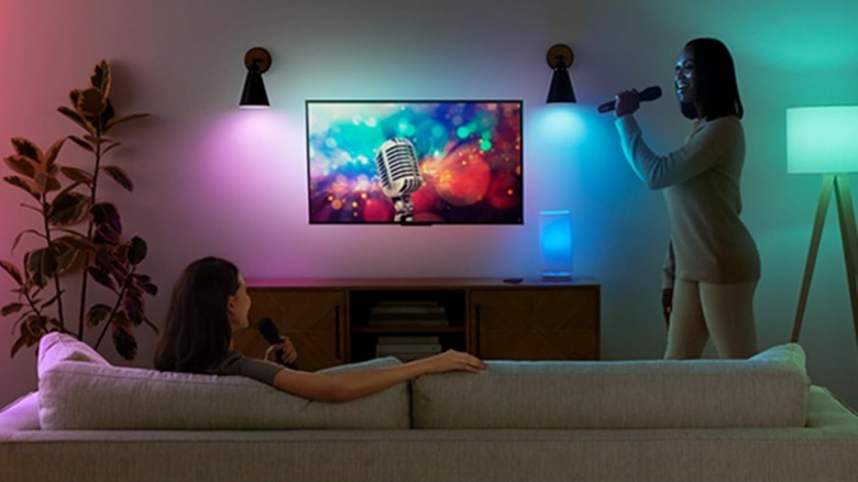 Amazon Basics smart light bulbs lighting colors during living room karaoke