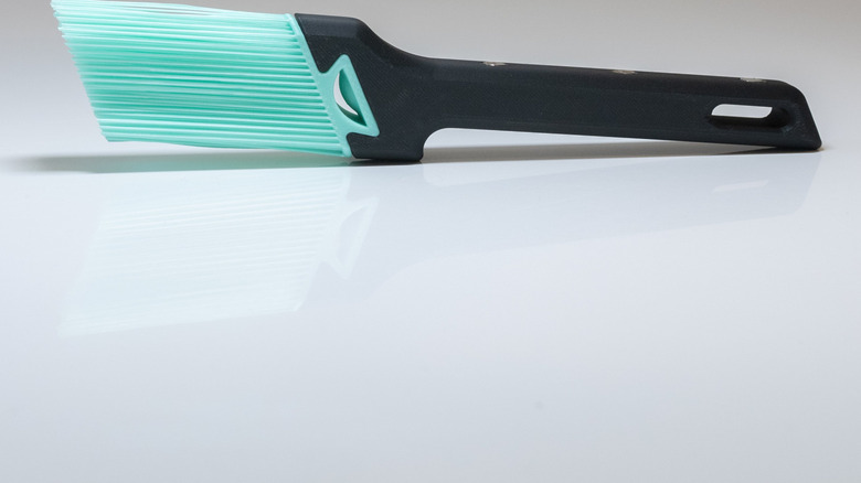 A 3D printed small brush with bristles made from bridged filament