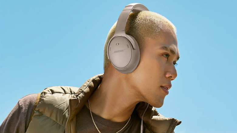 Man wearing Bose QuietComfort Wireless headphones