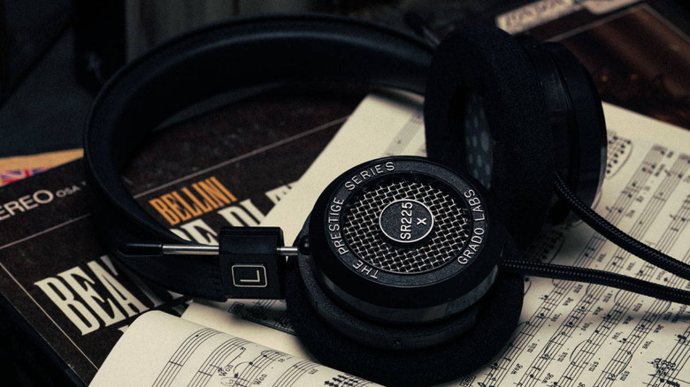 Grado SR225x resting on top of a music sheet.