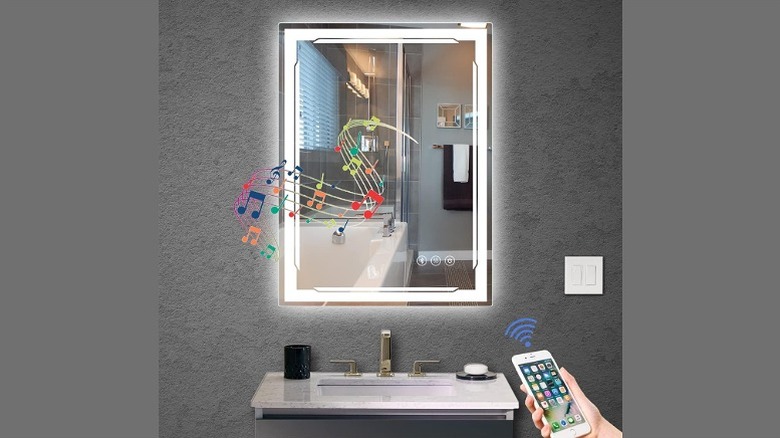 Smart mirror with music and smartphone in hand