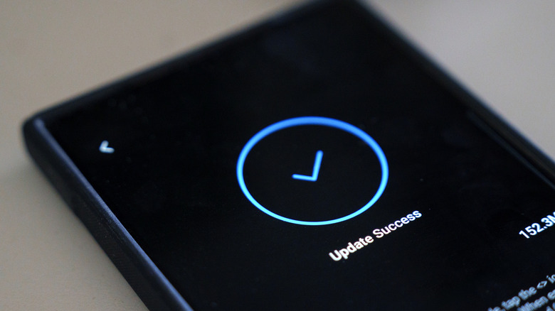 A phone showing a successful software update
