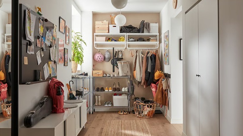 Modern space with a memo board containing photos and sticky notes.