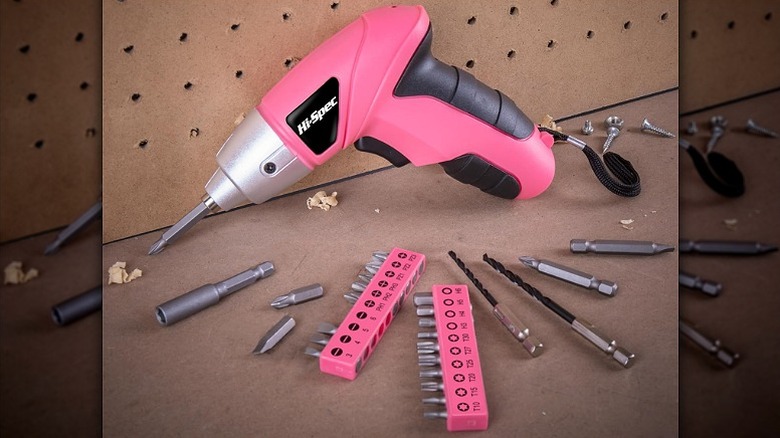 Electric screwdriver and its accessories spread around it