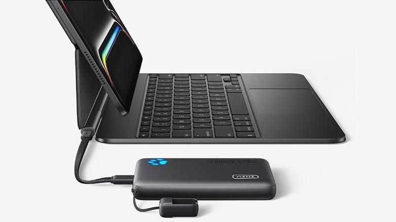 Portable charger connected to a laptop
