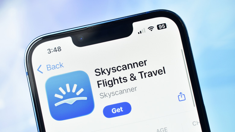 The Skyscanner app page open on an iPhone's App Store