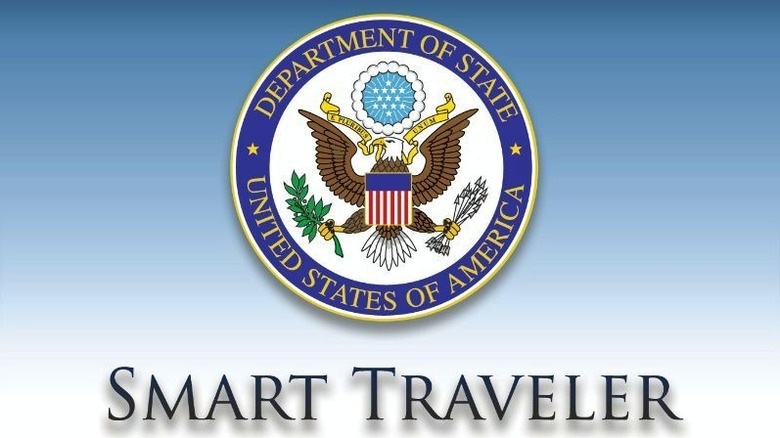 The words "Smart Traveler" under the U.S. State Department logo
