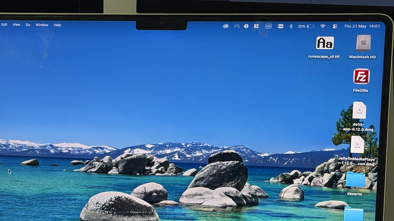 Photo of Macbook menu bar off screen
