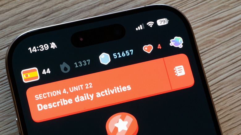 An iPhone showing a Spanish lesson in the Duolingo app