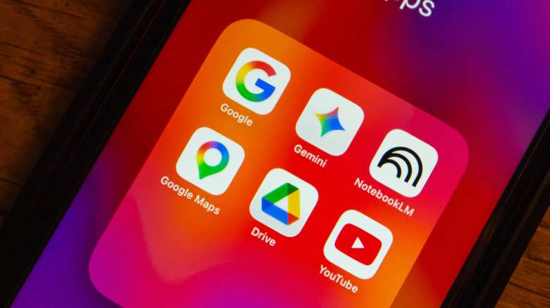An iPhone folder of apps showing Google, Gemini, NotebookLM, Google Maps, Google Drive, and YouTube app icons