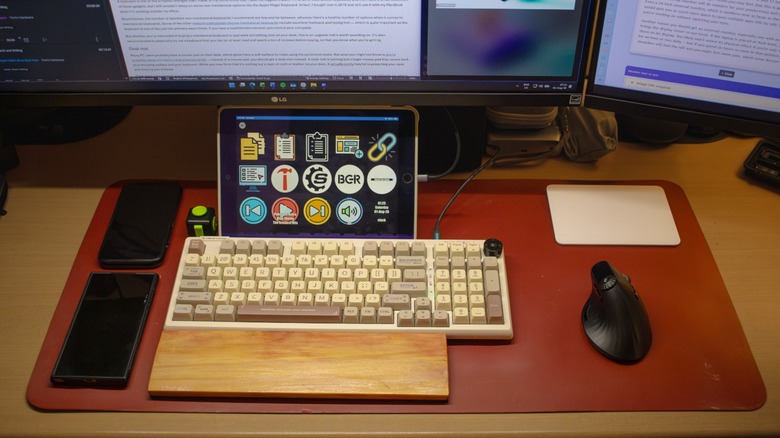 the author's peripherals placed on a desk pad